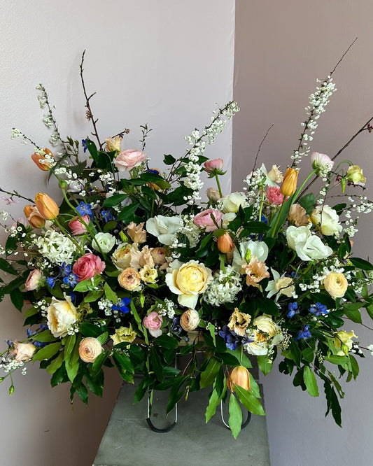 Casket or Standing spray made with sustainable products and seasonal flowers in Austin, Texas