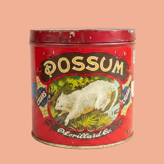 red vintage possum cigar tin